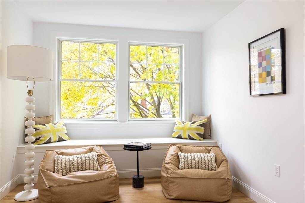 85 Naples Road, Unit 2 Brookline, MA 02446 - Photo 20 of 28 a living room with furniture and window