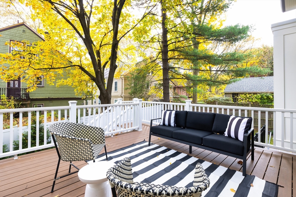 85 Naples Road, Unit 2 Brookline, MA 02446 - Photo 8 of 28 a view of a two chairs in the roof deck