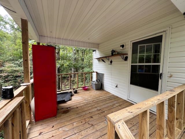 191 Crabtree Road Selmer, TN 38375 - Photo 3 of 12 a view of balcony with two chairs and a large window