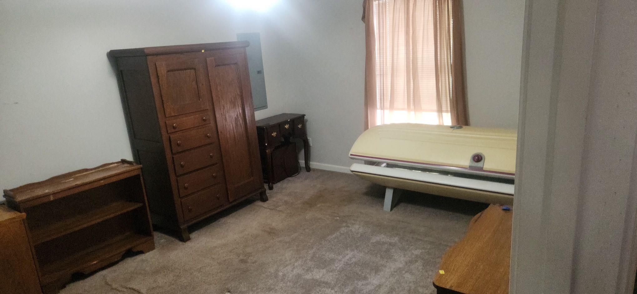 191 Crabtree Road Selmer, TN 38375 - Photo 7 of 12 a living room with a dresser and a window