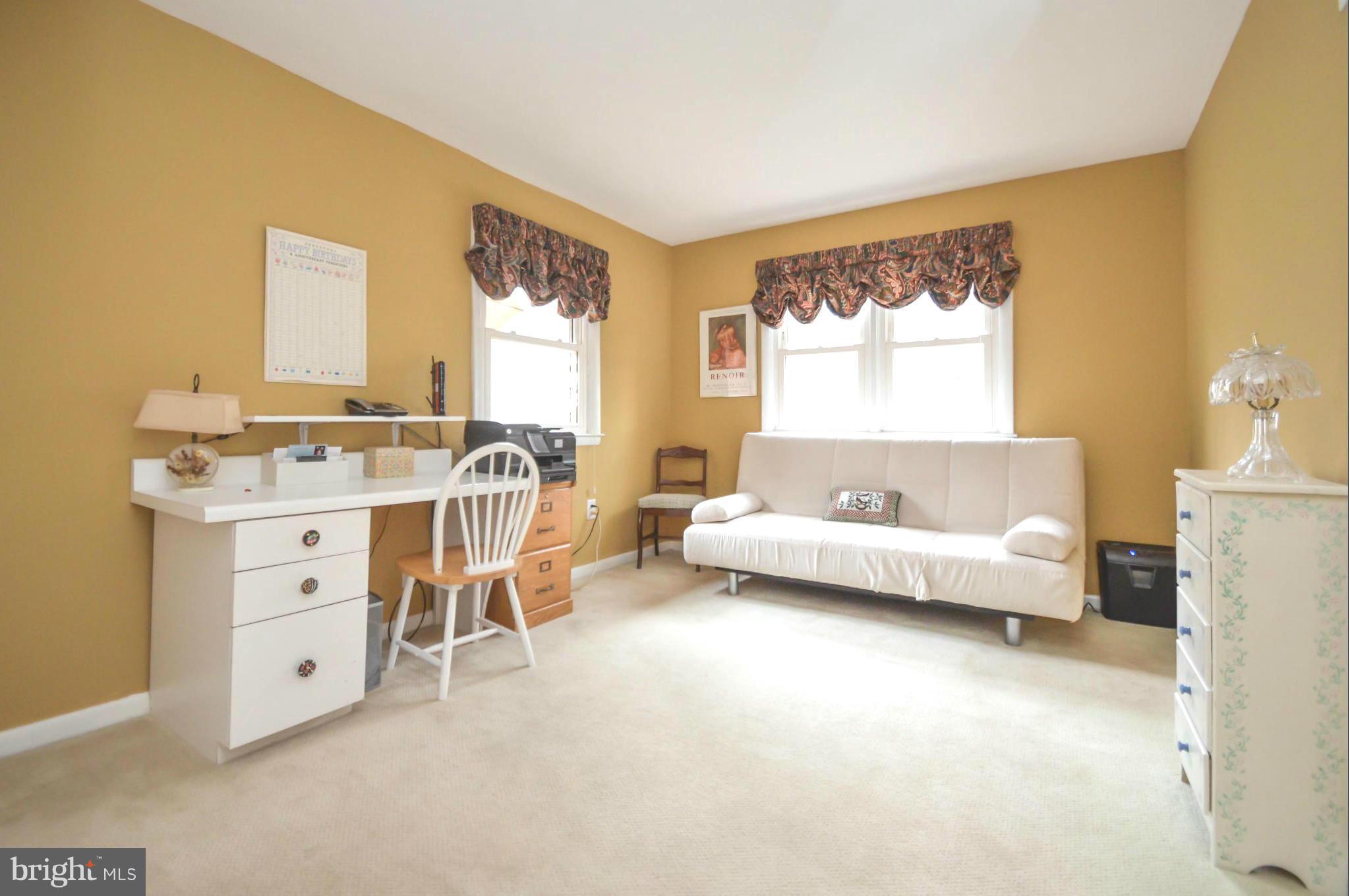901 Huntsman Road Towson, MD 21286 - Photo 15 of 30 a view of a bedroom with furniture and windows