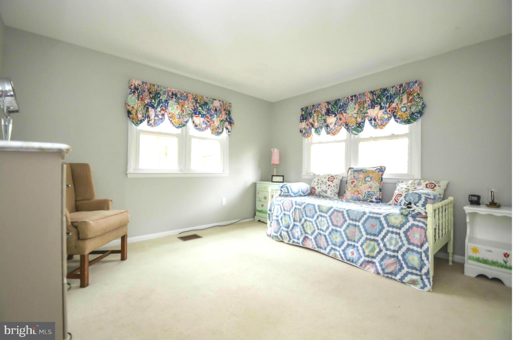 901 Huntsman Road Towson, MD 21286 - Photo 17 of 30 a bed room with furniture and a window