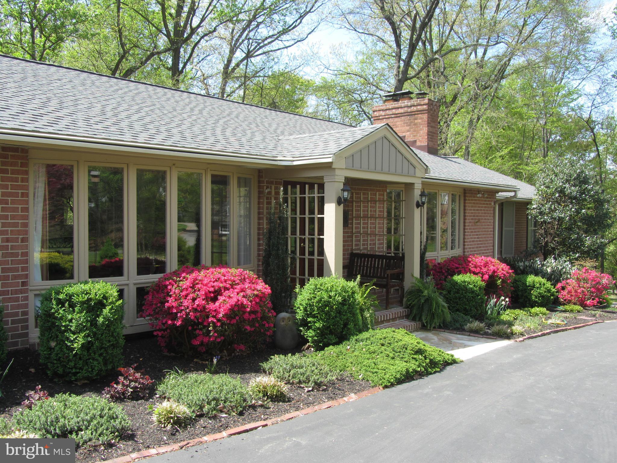 901 Huntsman Road Towson, MD 21286 - Photo 27 of 30 a front view of a house with garden