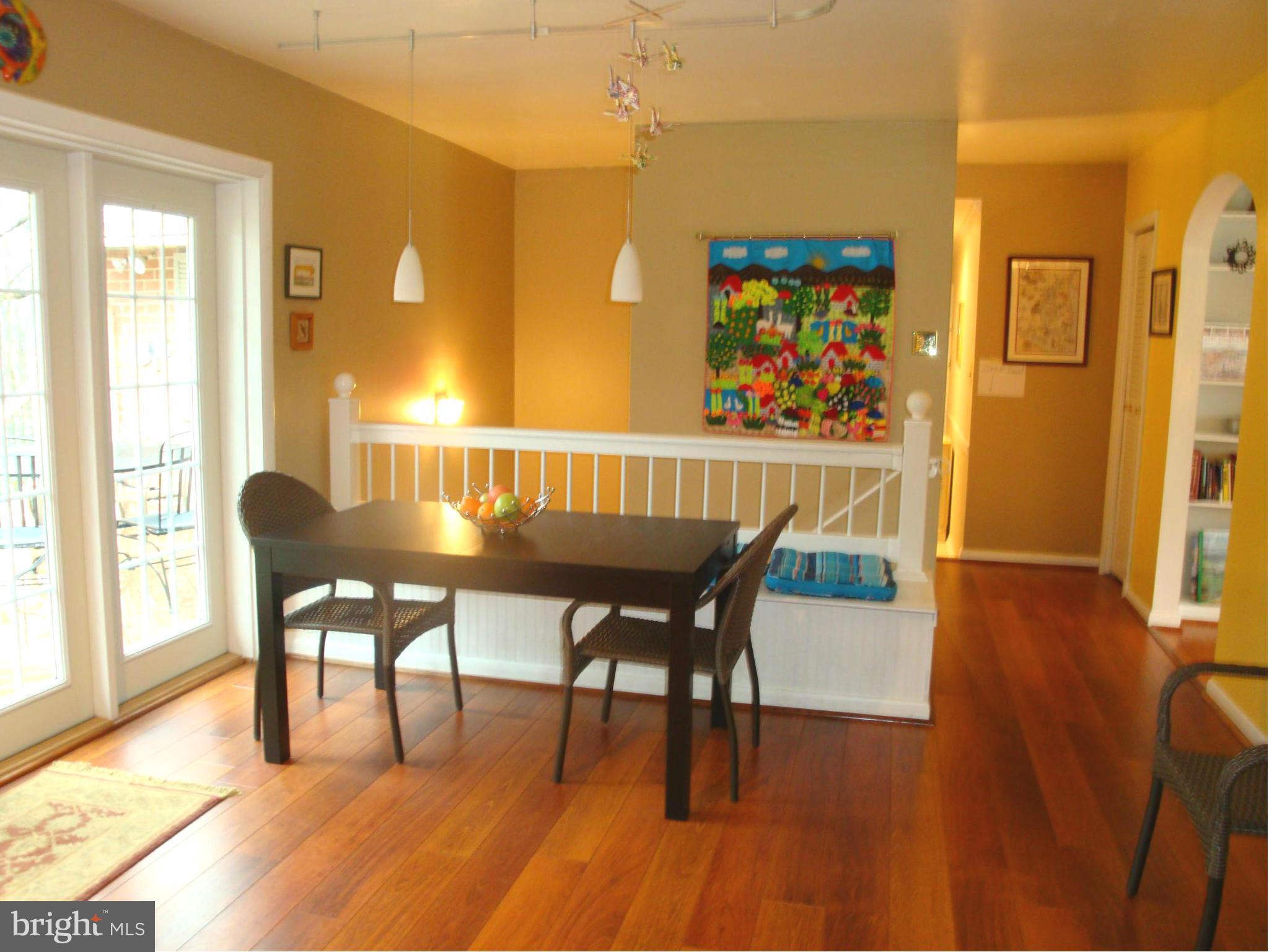 901 Huntsman Road Towson, MD 21286 - Photo 6 of 30 a view of a dining room with furniture a chandelier and wooden floor