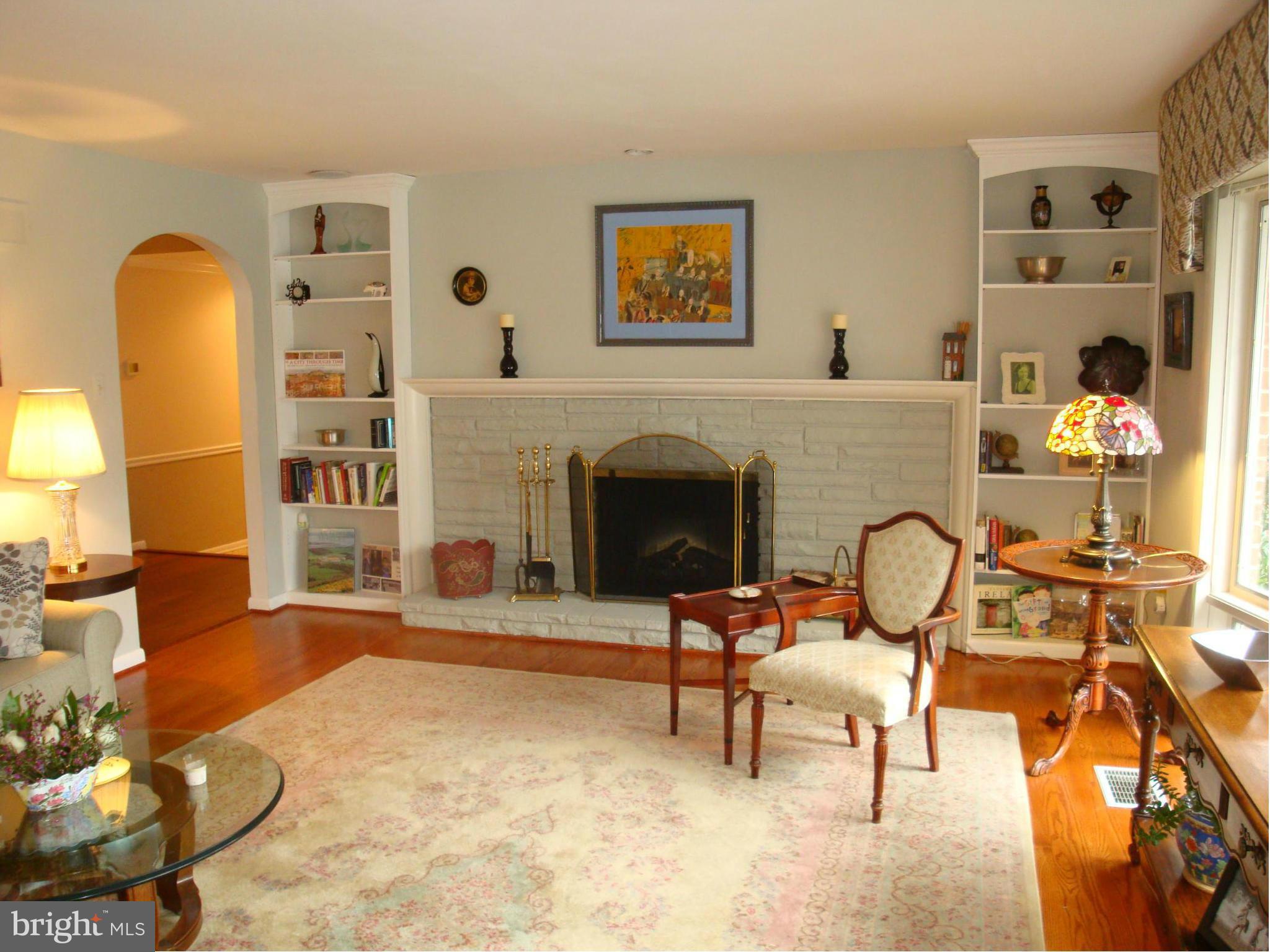 901 Huntsman Road Towson, MD 21286 - Photo 9 of 30 a living room with furniture and a fireplace