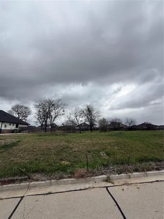a view of a golf course with a garden