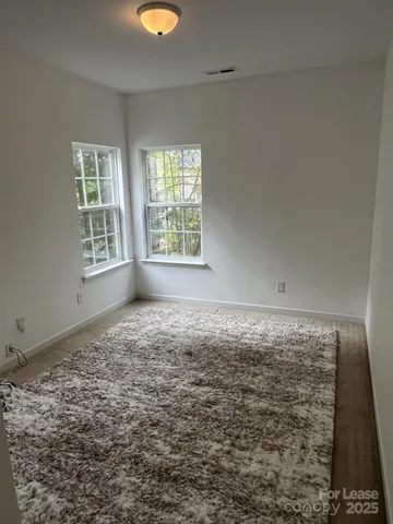 a view of an empty room with window