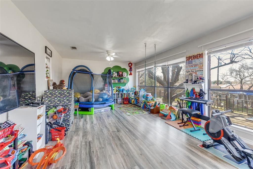 1304 South Hatcher Street Decatur, TX 76234 - Photo 15 of 36 a living room filled with lots of furniture
