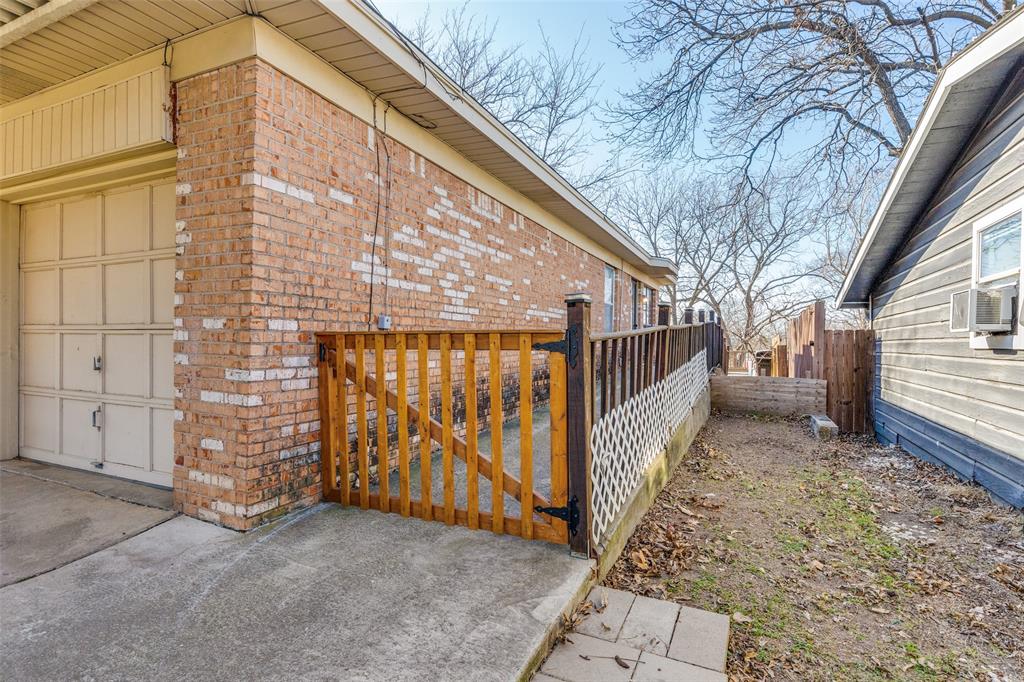 1304 South Hatcher Street Decatur, TX 76234 - Photo 25 of 36 a view of a house with a yard