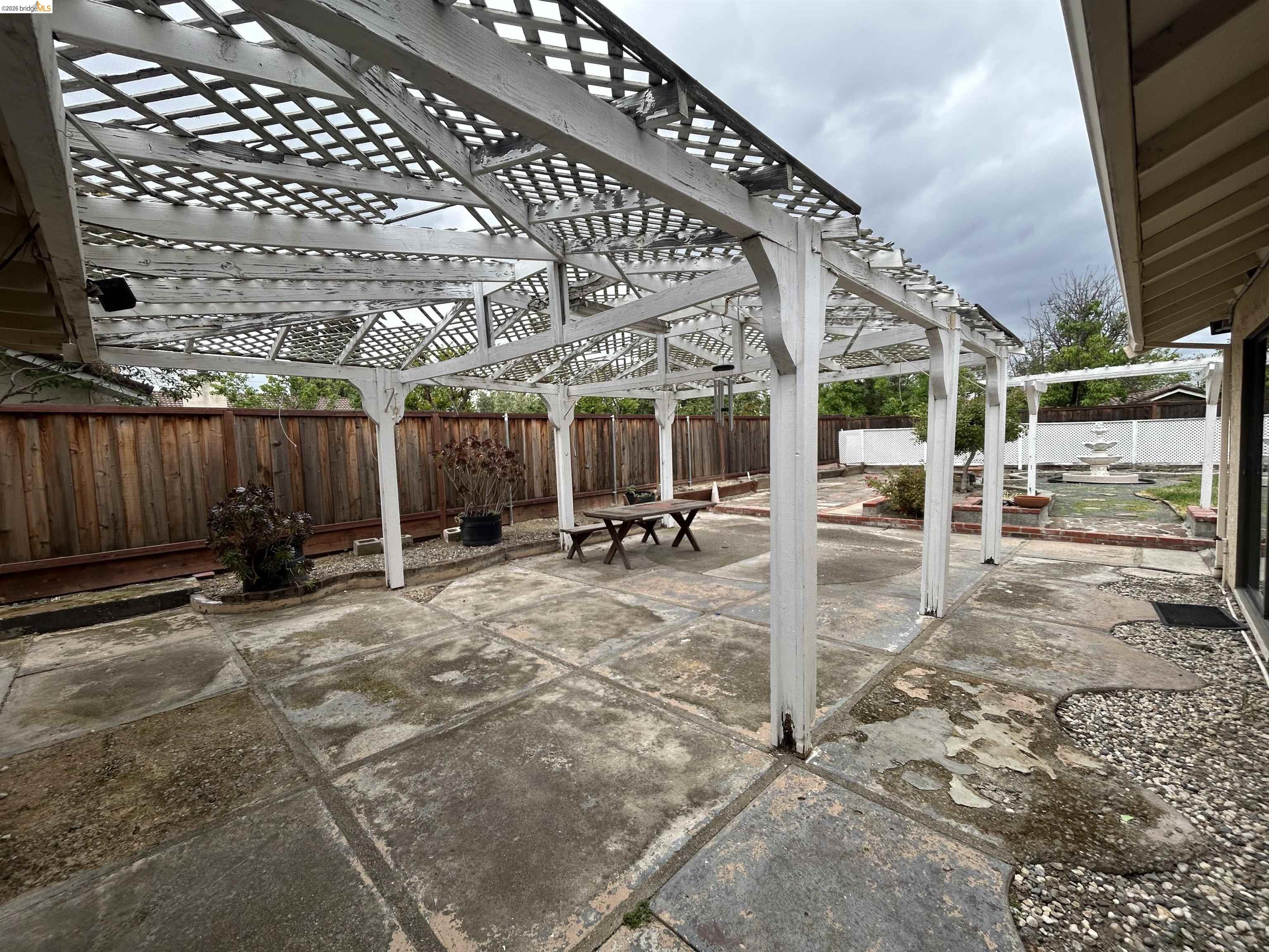 2632 Point Lobos Court Antioch, CA 94531 - Photo 13 of 27 Fenced backyard with a patio, a pergola, and outdoor dining space