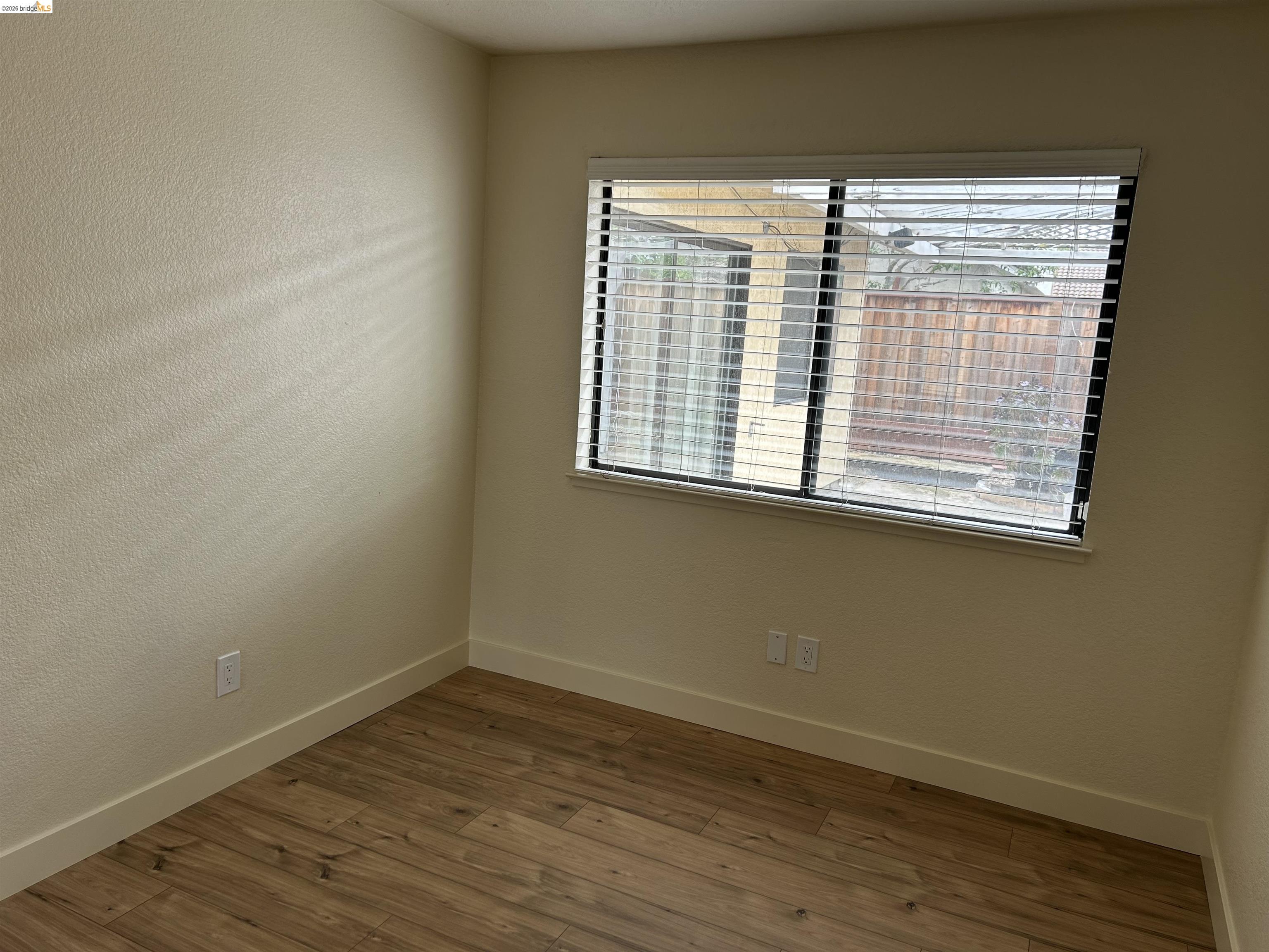 2632 Point Lobos Court Antioch, CA 94531 - Photo 14 of 27 Unfurnished room with a textured wall and wood finished floors