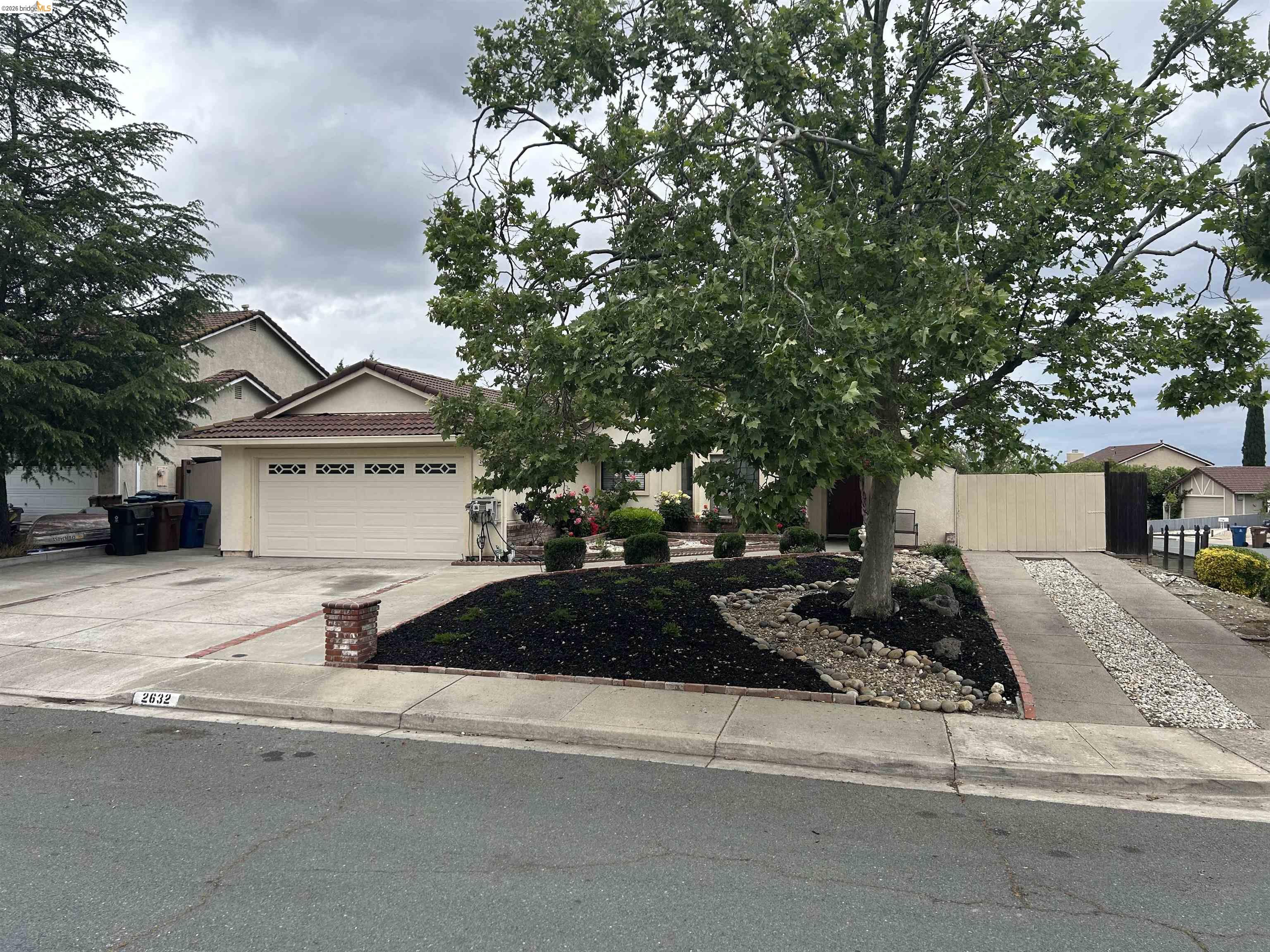 2632 Point Lobos Court Antioch, CA 94531 - Photo 2 of 27 View of front of house featuring driveway, an attached garage, a tile roof, and stucco siding