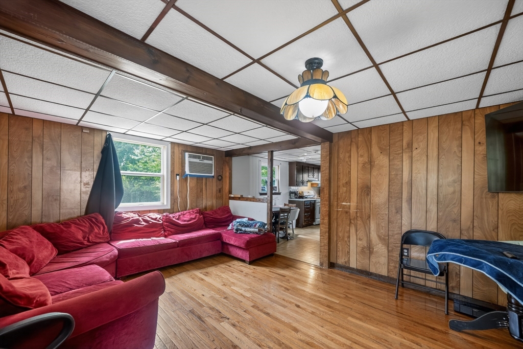 2 Mill Street Beverly, MA 01915 - Photo 12 of 15 a living room with furniture a ceiling fan and a window