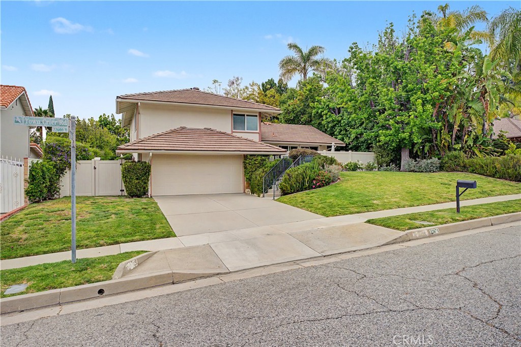 22671 Town Crier Road Calabasas, CA 91302 - Photo 3 of 35 a view of outdoor space yard and front view of a house