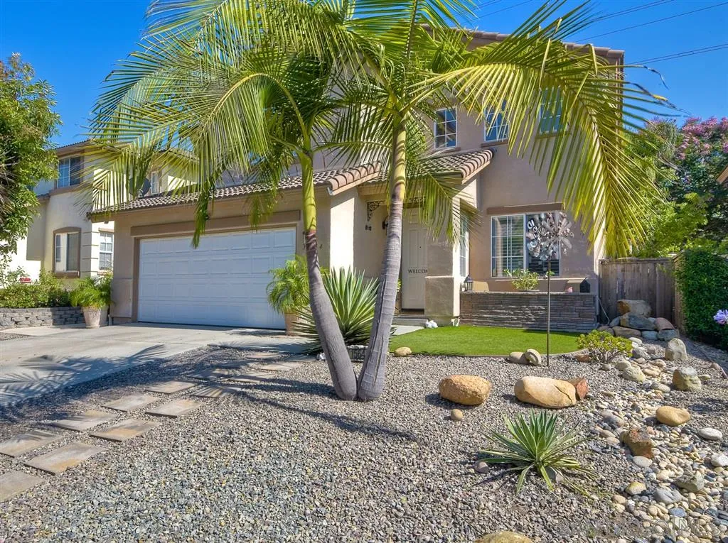 11564 Village Ridge Road San Diego, CA 92131 - Photo 2 of 25 a view of a chair and table in the backyard