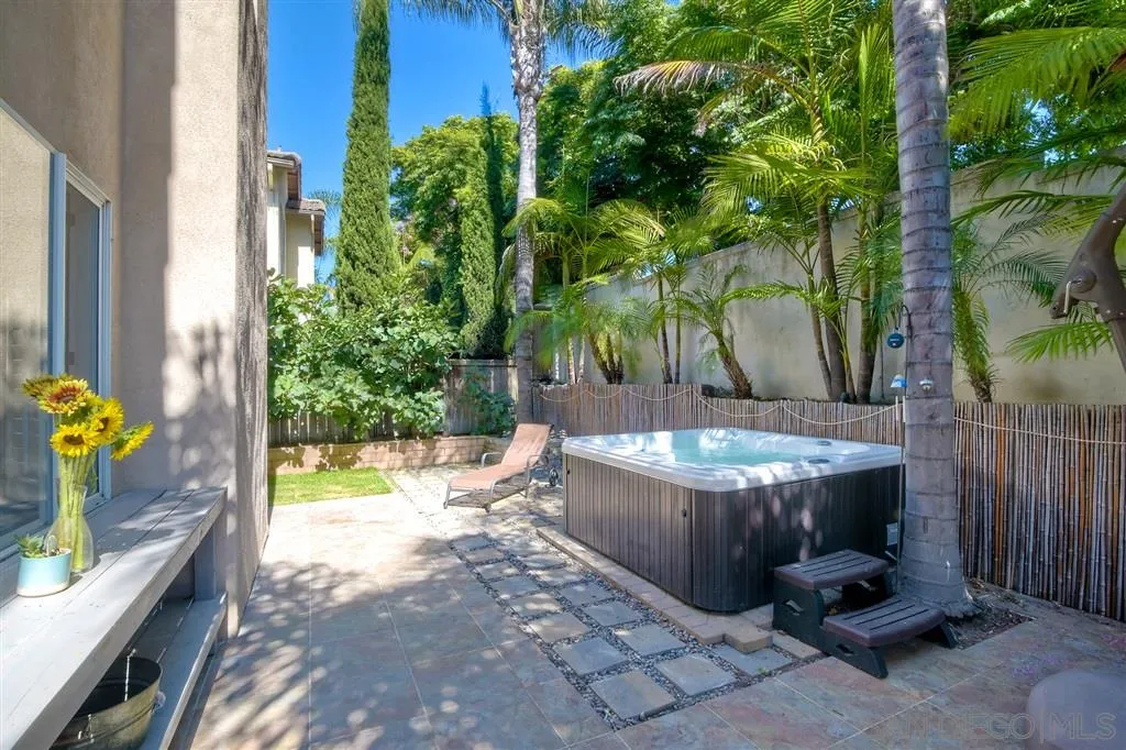 11564 Village Ridge Road San Diego, CA 92131 - Photo 23 of 25 a view of a backyard with plants and garden