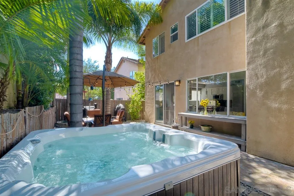 11564 Village Ridge Road San Diego, CA 92131 - Photo 24 of 25 a view of a house with backyard and sitting area