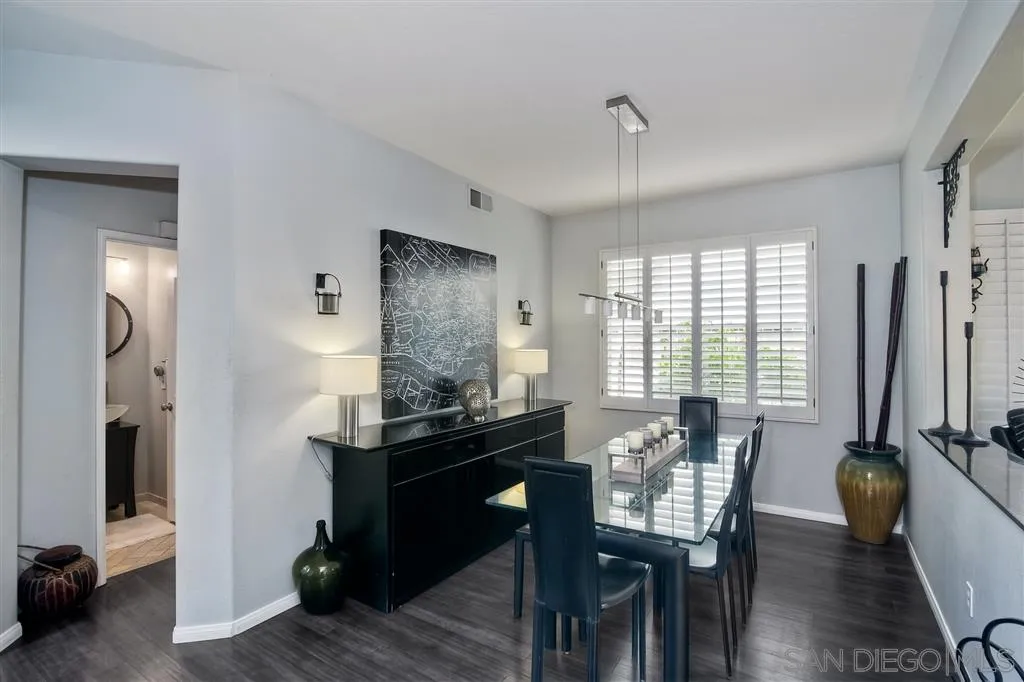 11564 Village Ridge Road San Diego, CA 92131 - Photo 5 of 25 a view of a dining room with furniture window and wooden floor