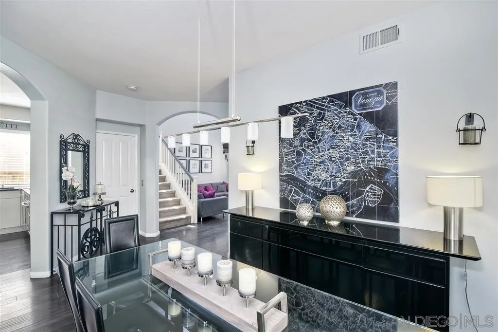 11564 Village Ridge Road San Diego, CA 92131 - Photo 6 of 25 a room with furniture and wooden floor