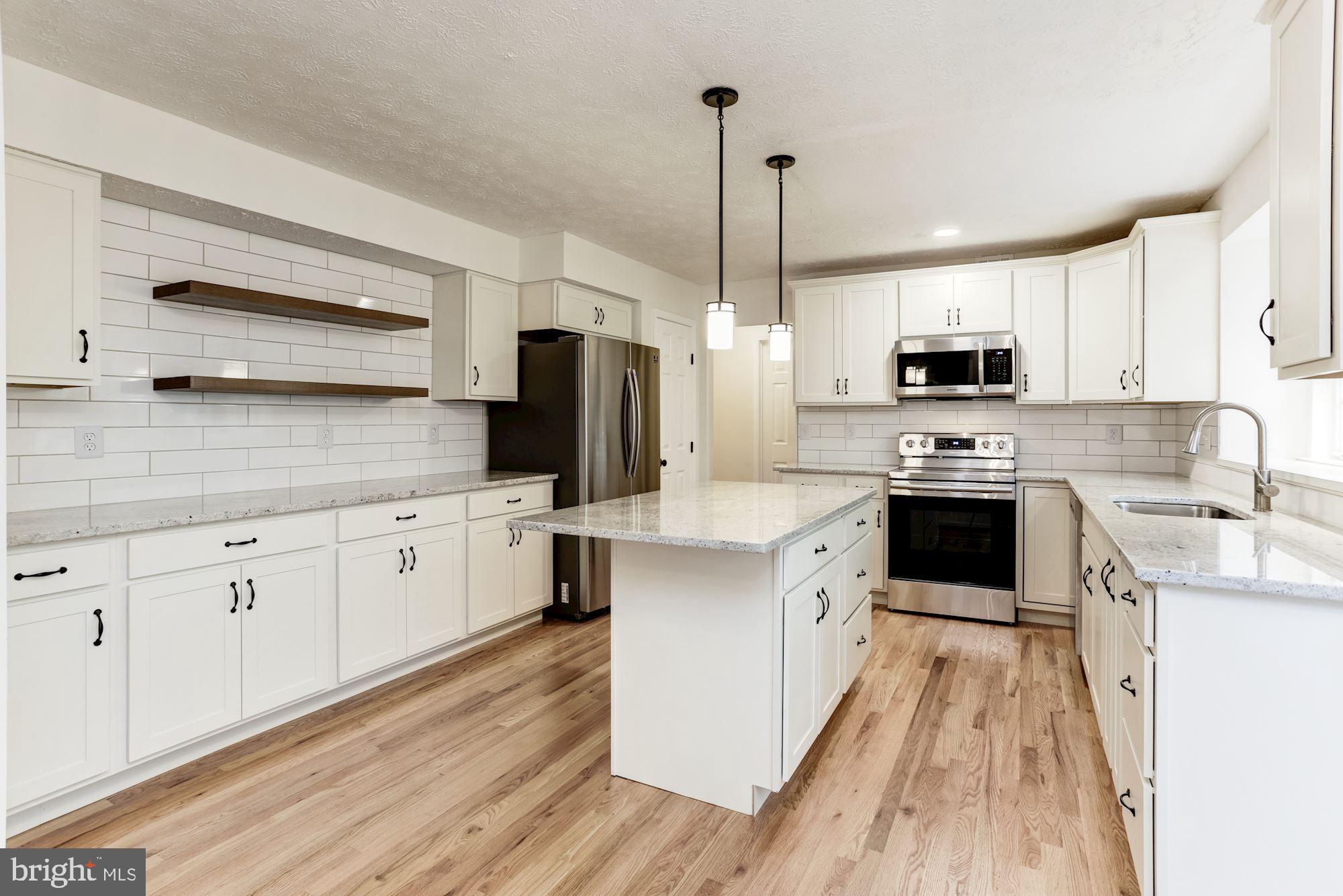 6253 Martin Road Columbia, MD 21044 - Photo 11 of 56 Stunning Renovated Kitchen