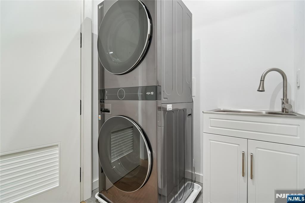 426 Aurora Avenue Cliffside Park, NJ 07010 - Photo 26 of 38 a close view of utility room with washer and dryer