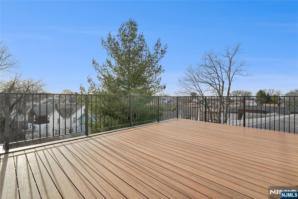 426 Aurora Avenue Cliffside Park, NJ 07010 - Photo 31 of 38 a balcony with wooden floor