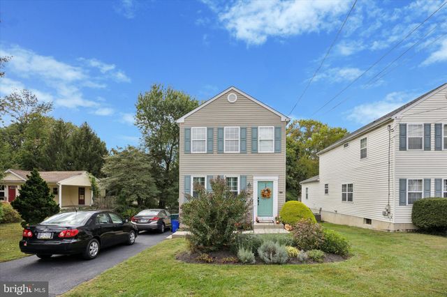 a view of outdoor space with deck and yard
