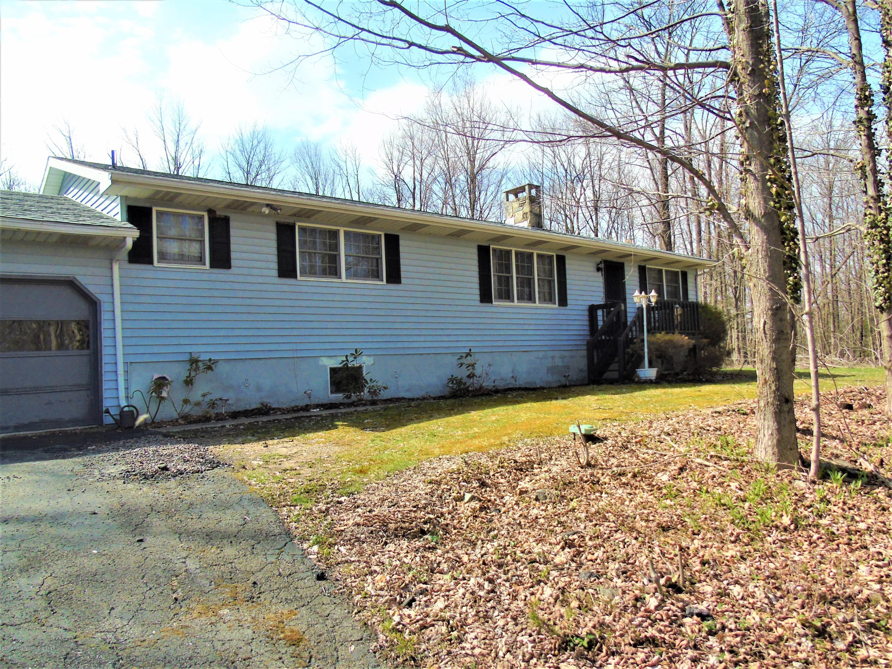 123 Anderson Road Lake Ariel, PA 18436 - Photo 27 of 37 a front view of house with yard