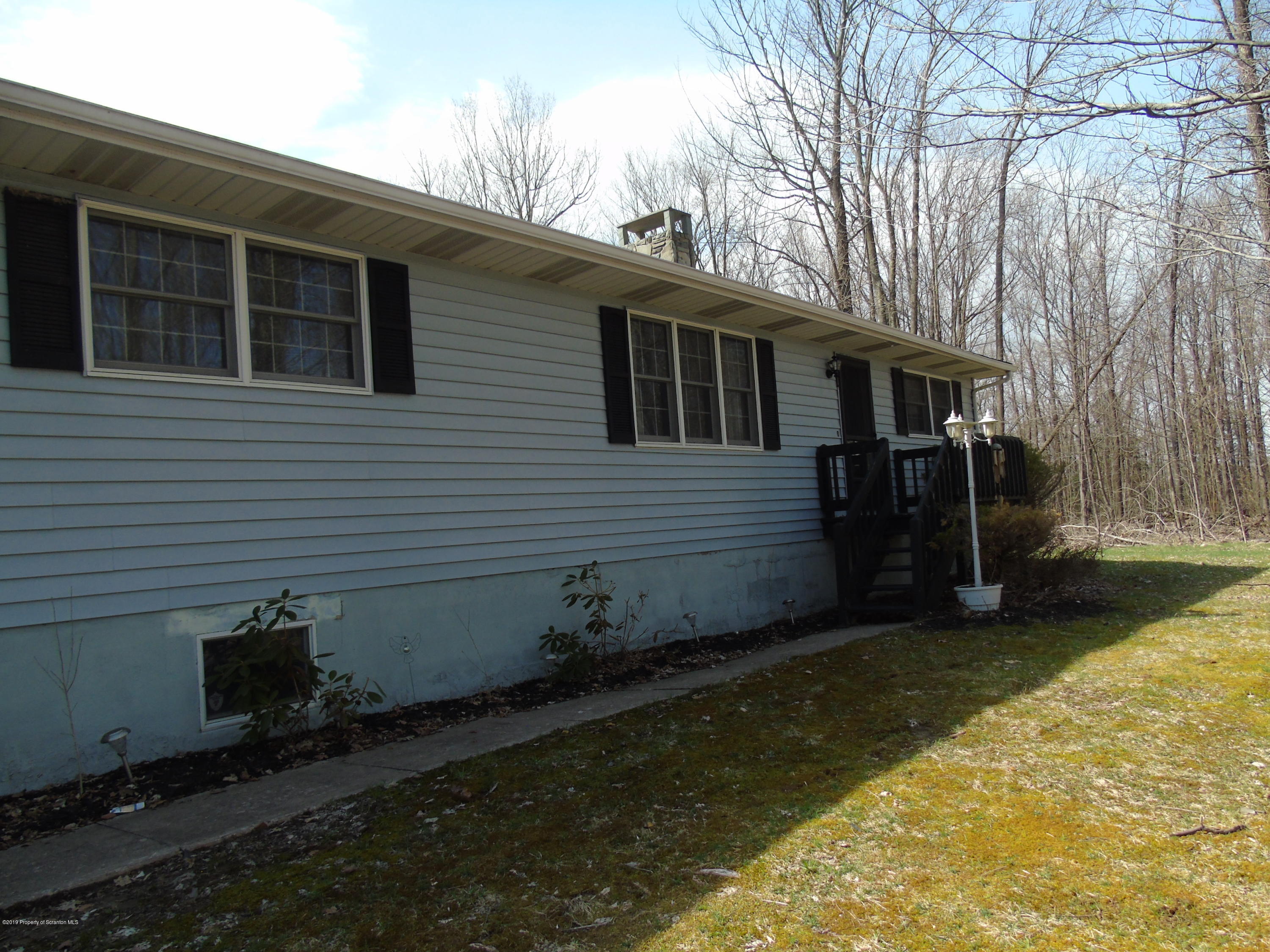 123 Anderson Road Lake Ariel, PA 18436 - Photo 29 of 37 a backyard of a house