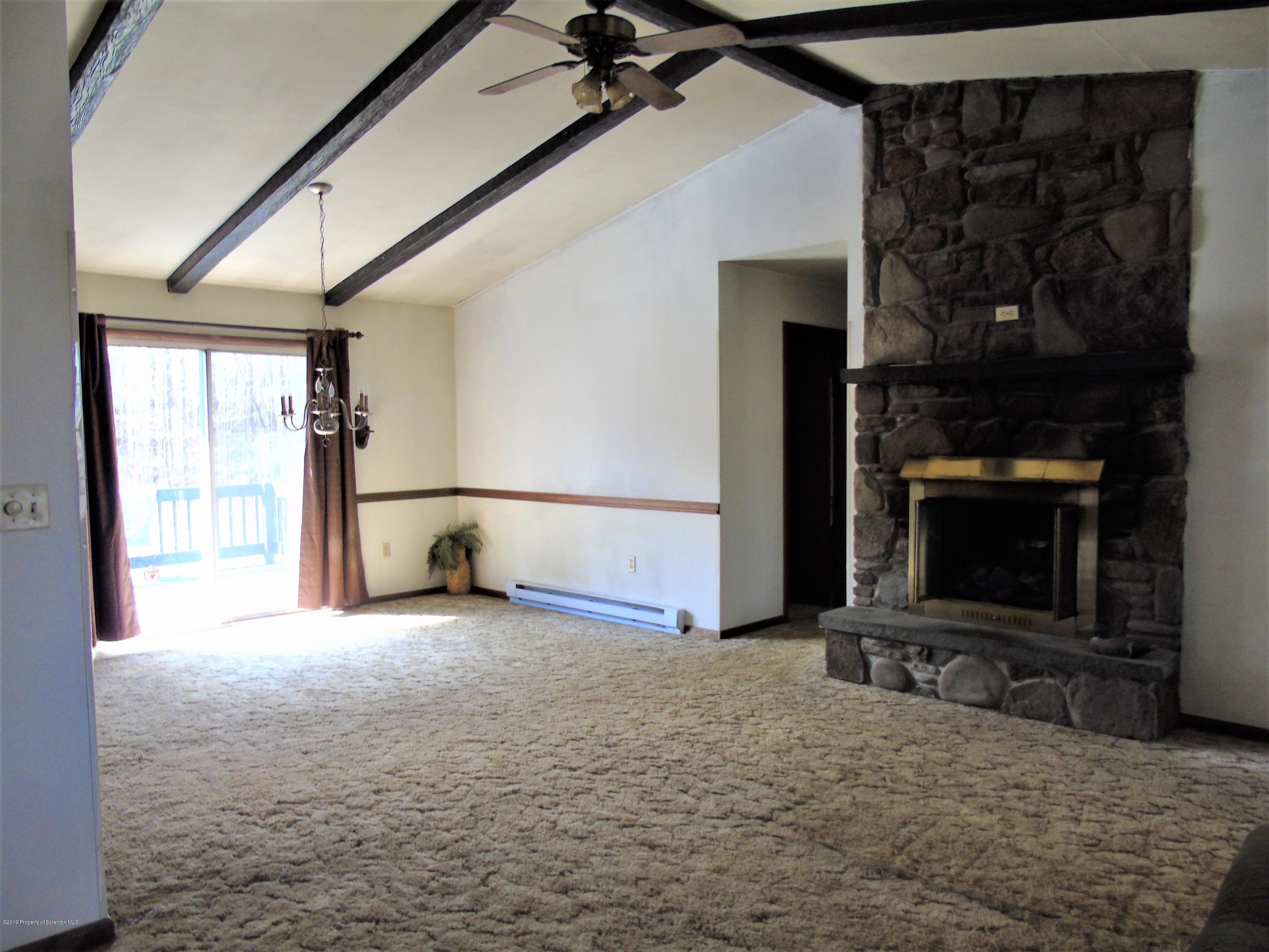 123 Anderson Road Lake Ariel, PA 18436 - Photo 10 of 37 a view of a room with gym equipment