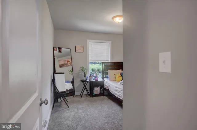 a room with furniture and a chair