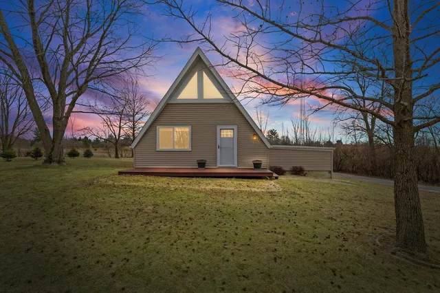 a house with trees in the background