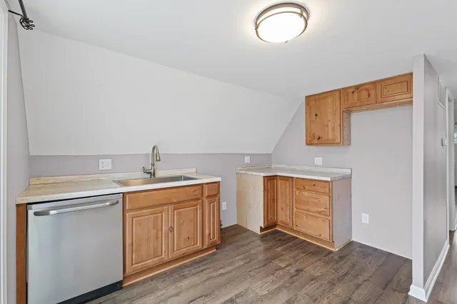 a utility room with a sink dryer and washer