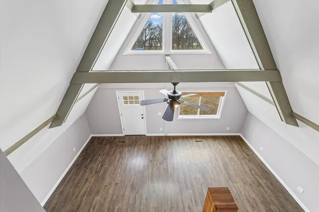 a view of a livingroom with wooden floor