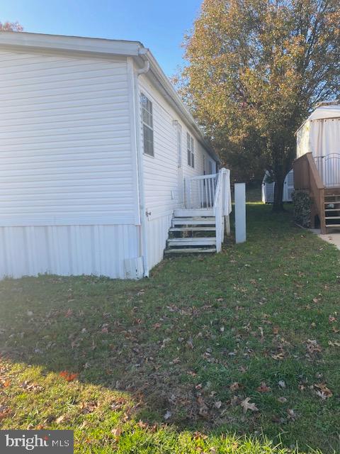 Emily Drive, Unit 1873 Edgewood, MD 21040 - Photo 8 of 8 a view of a backyard with wooden fence