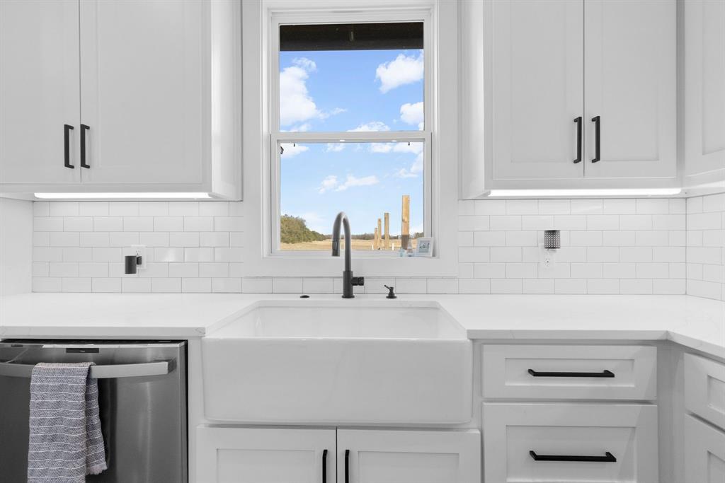 4700 County Road 1040 Celeste, TX 75423 - Photo 15 of 40 a bathroom with a sink and a mirror