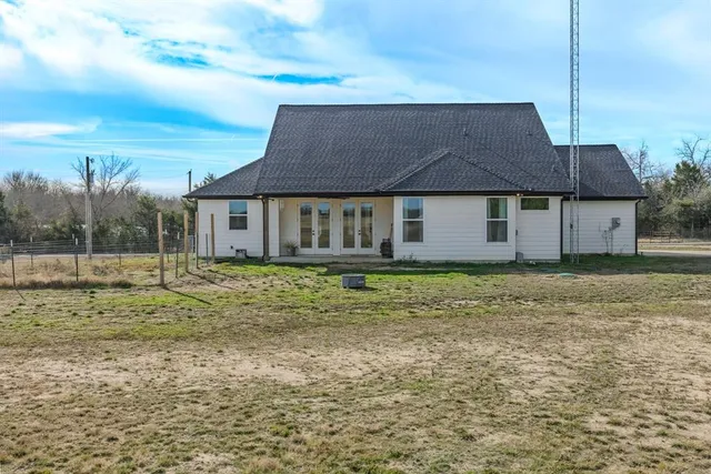 a house view with a garden space