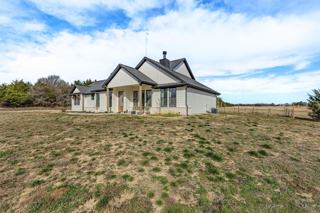 4700 County Road 1040 Celeste, TX 75423 - Photo 32 of 40 a house with a garden