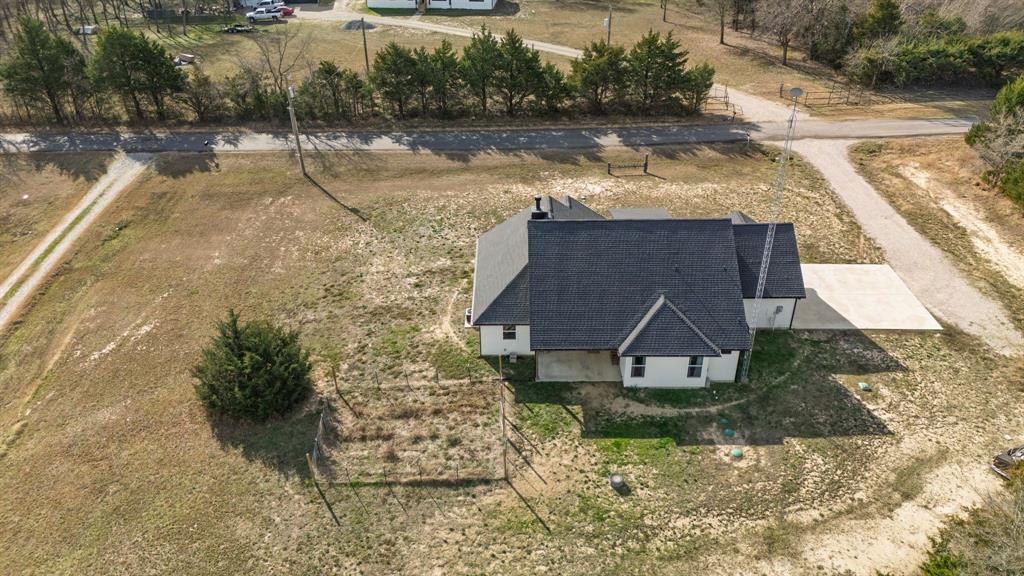 4700 County Road 1040 Celeste, TX 75423 - Photo 38 of 40 a view of house with a yard