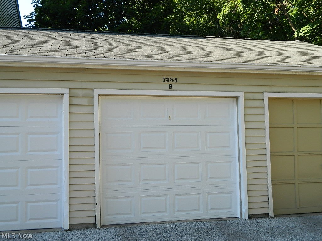 7385 Fox Mill Road, Unit 32B Mentor, OH 44060 - Photo 16 of 17 The Garages are Detached, There is an Opener for the Garage. There is Also One Designated Parking Spot for this Unit as Well.