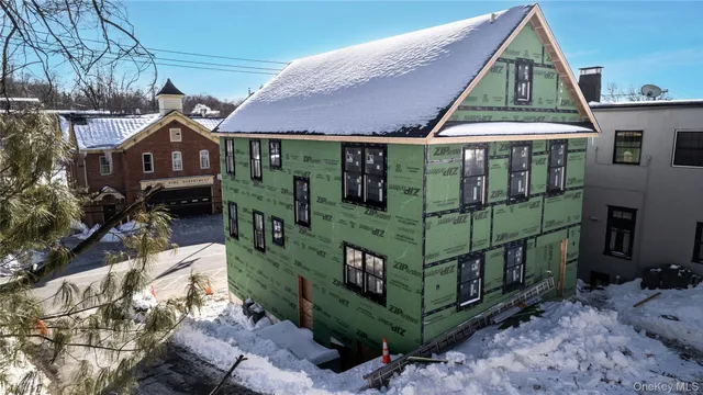 a view of a small yard in front of a house
