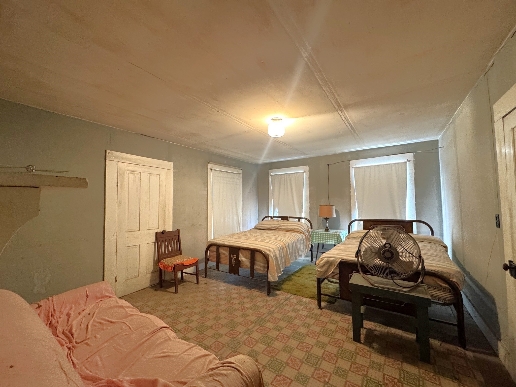 Tbd South Pitzer Street Colmesneil, TX 75938 - Photo 19 of 40 a bedroom with two beds and a window