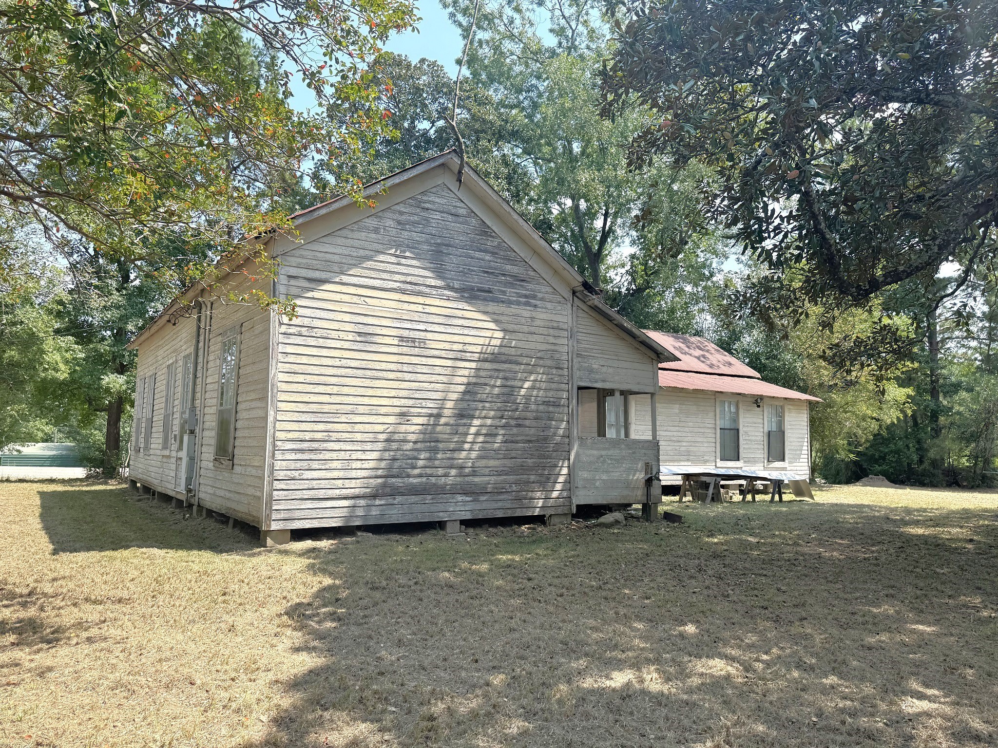 Tbd South Pitzer Street Colmesneil, TX 75938 - Photo 34 of 40 a view of a house with a yard