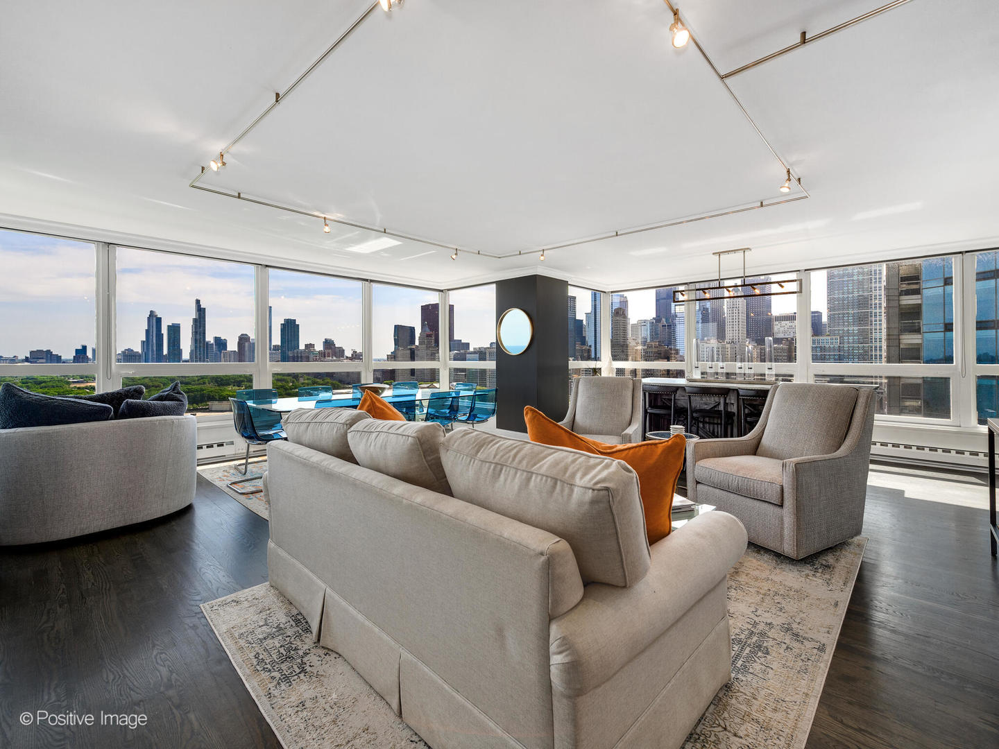 360 East Randolph Street, Unit 2204 Chicago, IL 60601 - Photo 11 of 28 a living room with furniture and a view of kitchen