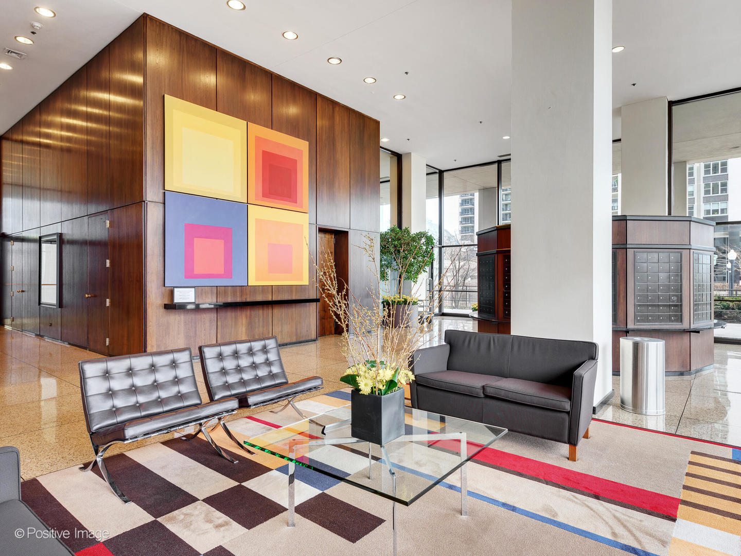 360 East Randolph Street, Unit 2204 Chicago, IL 60601 - Photo 26 of 28 a living room with furniture and a table