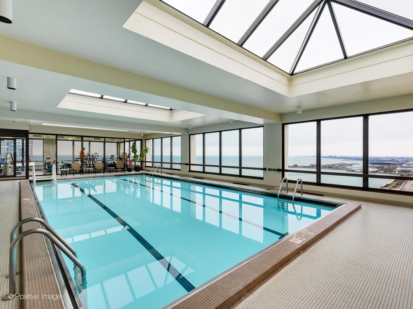 360 East Randolph Street, Unit 2204 Chicago, IL 60601 - Photo 27 of 28 a view of a swimming pool with a balcony