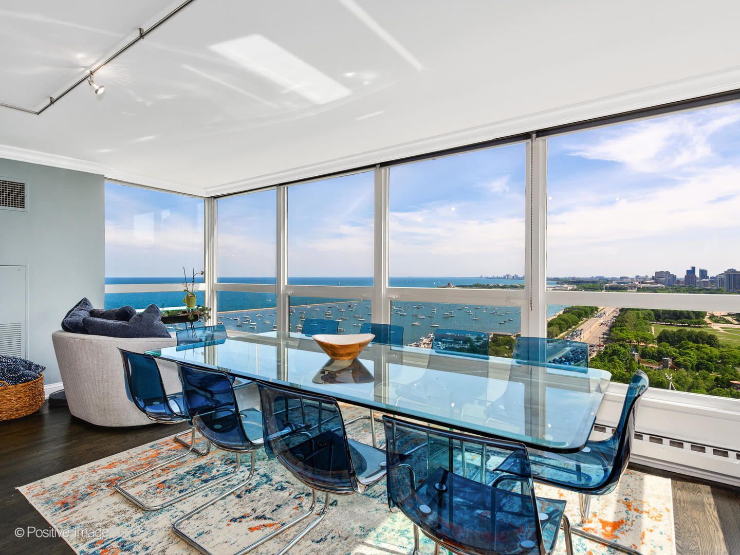 360 East Randolph Street, Unit 2204 Chicago, IL 60601 - Photo 5 of 28 a living room with furniture and a floor to ceiling window