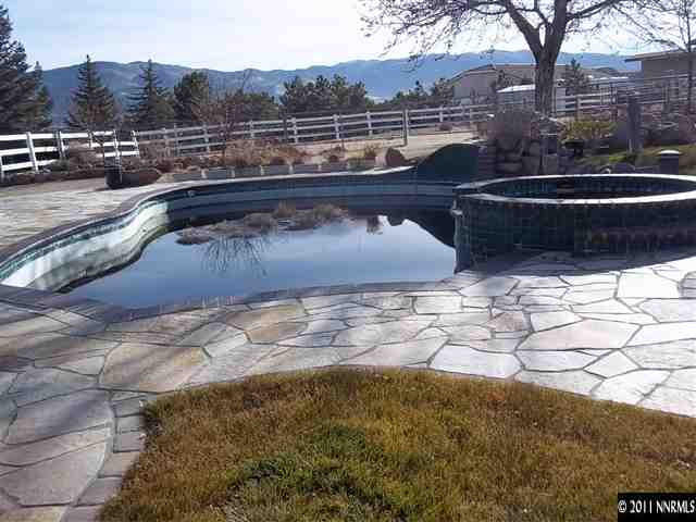 1000 Lampe Road Reno, NV 89511 - Photo 13 of 13 a view of a swimming pool with a yard