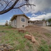a house view with a outdoor space