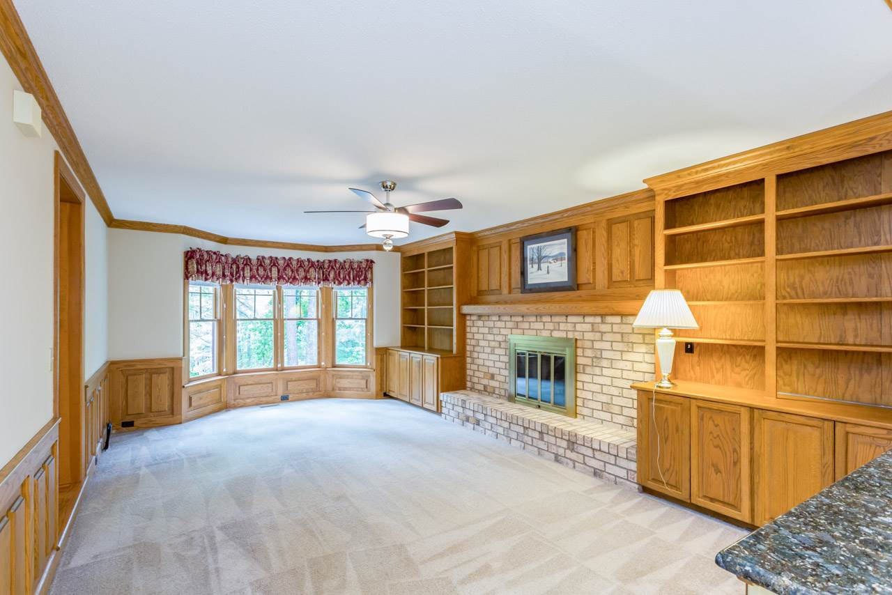 5200 Country Trail Raleigh, NC 27613 - Photo 5 of 25 Beautiful bay window in family room overlooks peaceful wooded front yard. Den/Family/Great Room